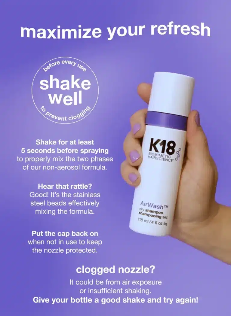 Person holding K18 AirWash dry shampoo with usage instructions on a purple background.