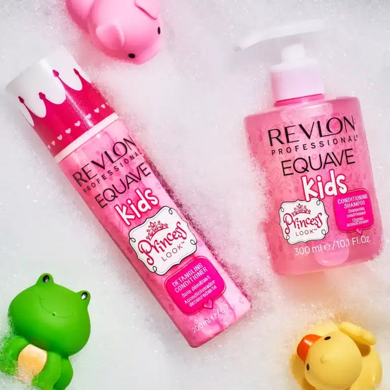 Revlon Equave Kids shampoo and conditioner bottles in foam with rubber duck and frog toys.