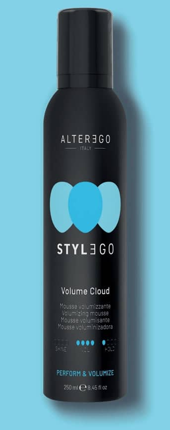 Alter Ego Stylego Volume Cloud hair mousse bottle against blue background.